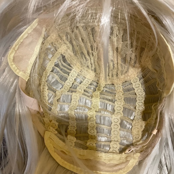Punk Style Synthetic Wig. Platinum Used in photo shoots on mannequin head. - Picture 9 of 9